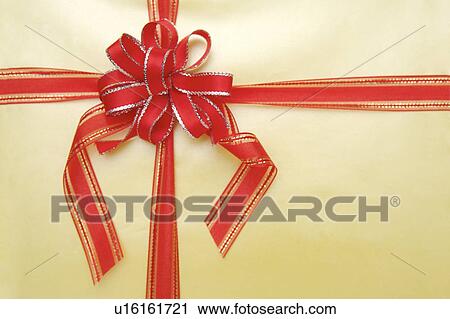 Close-up of a red tied ribbon View Large Photo Image Stock Image - Close-up of a red tied ribbon. Fotosearch