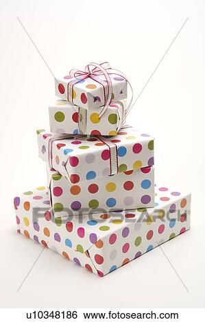 Close-up of five wrapped presents View Large Photo Image Stock Photograph - Close-up of five wrapped presents. Fotosearch