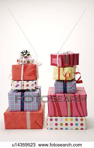 Close-up of two stack wrapped presents View Large Photo Image Stock Image - Close-up of two stack wrapped presents. Fotosearch