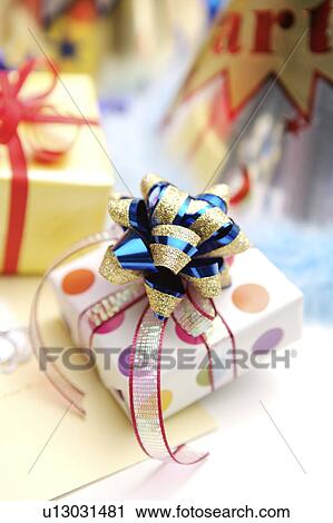 Close-up of wrapped gifts View Large Photo Image Stock Image - Close-up of wrapped gifts. Fotosearch