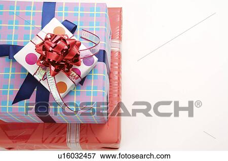 Stock Photo - Close-up of wrapped presents. Fotosearch