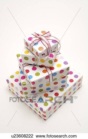 Five wrapped gifts with ribbons View Large Photo Image Stock Image - Five wrapped gifts with ribbons. Fotosearch