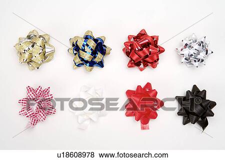 Stock Photo - Multi-colored ribbons with flower shape. Fotosearch