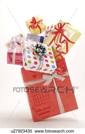 Stock Photography - Wrapped gifts in the mid-air. Fotosearch