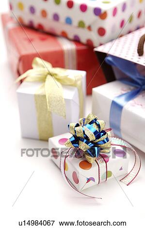 Stock Photo - Wrapped gifts with ribbon. Fotosearch
