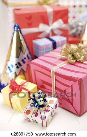 Wrapped gifts with ribbons View Large Photo Image Stock Image - Wrapped gifts with ribbons. Fotosearch
