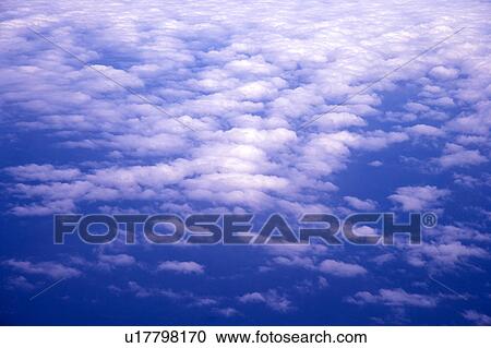 Stock Image - Cirrus in the clear sky. Fotosearch