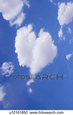 Cloud with heart shape in the clear sky View Large Photo Image Stock Image - Cloud with heart shape in the clear sky. Fotosearch