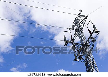 Stock Photo - Clouds in the clear sky and cables. Fotosearch