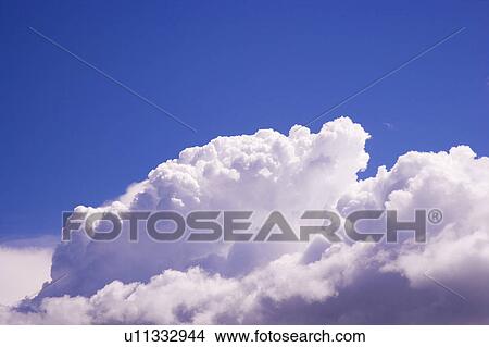 Clouds in the clear sky View Large Photo Image Picture - Clouds in the clear sky. Fotosearch