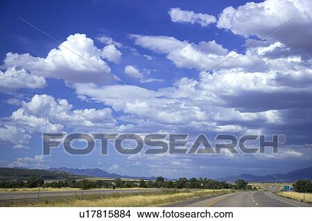 Clouds in the clear sky View Large Photo Image Picture - Clouds in the clear sky. Fotosearch