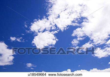 Clouds in the clear sky View Large Photo Image Picture - Clouds in the clear sky. Fotosearch