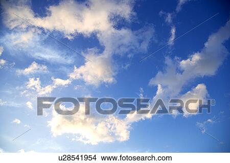Clouds in the clear sky View Large Photo Image Picture - Clouds in the clear sky. Fotosearch