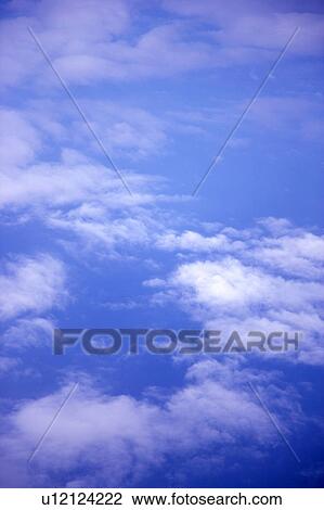 Clouds in the clear sky View Large Photo Image Stock Image - Clouds in the clear sky. Fotosearch