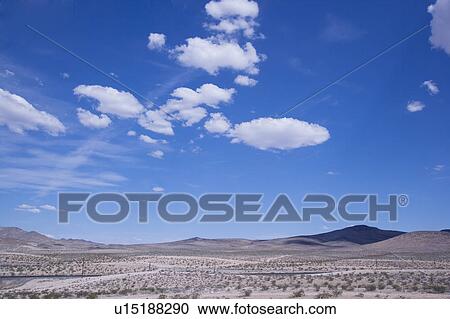Clouds in the clear sky View Large Photo Image Stock Image - Clouds in the clear sky. Fotosearch