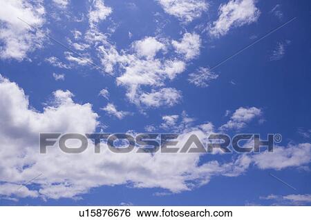 Clouds in the clear sky View Large Photo Image Stock Photograph - Clouds in the clear sky. Fotosearch