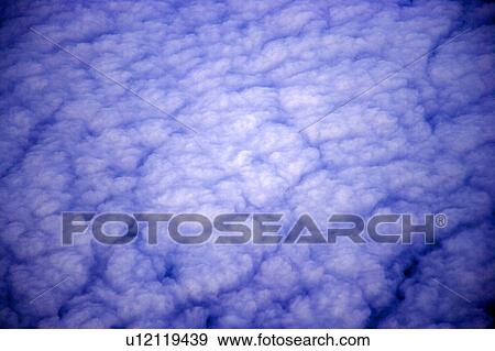 Stock Photo - Cloudscape in the sky. Fotosearch