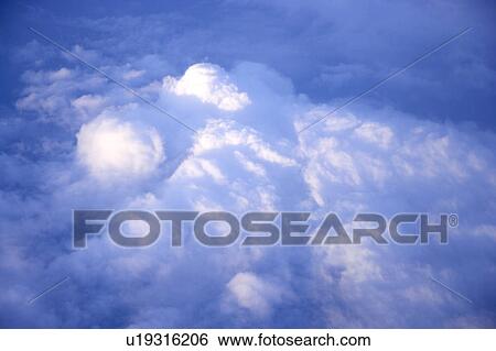 Stock Photograph - Cumulus cloud in the sky. Fotosearch