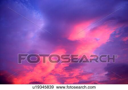 Stock Photo - Pink clouds in the sky. Fotosearch