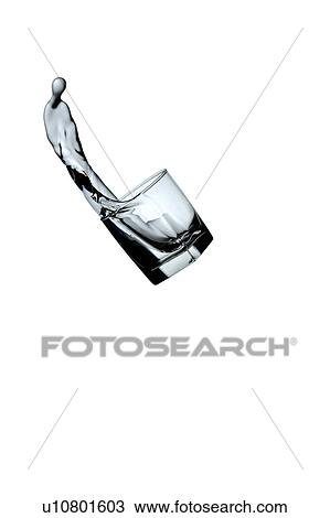 Close-up of water splashing from a glass View Large Photo Image Stock Image - Close-up of water splashing from a glass. Fotosearch