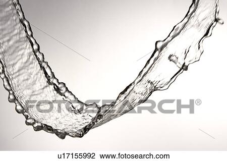Cross section of a steam of flowing water View Large Photo Image Stock Image - Cross section of a steam of flowing water. Fotosearch
