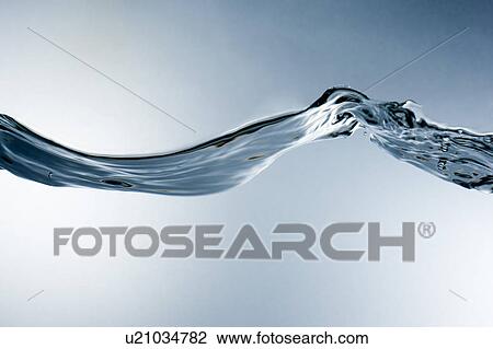 Stock Image - Cross section of a steam of flowing water. Fotosearch