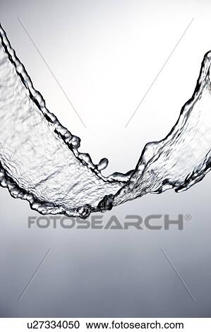 Cross section of a steam of flowing water View Large Photo Image Stock Image - Cross section of a steam of flowing water. Fotosearch