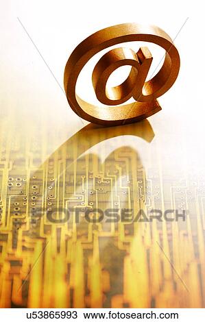 An "At" sign on a circuit board View Large Illustration Drawing - An "At" sign on a circuit board. Fotosearch