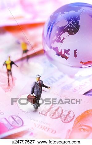 Little toy figurines standing on the paper money around a globe View Large Illustration Stock Illustration - Little toy figurines standing on the paper money around a globe. Fotosearch