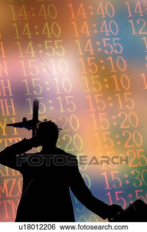 Stock Illustration - Silhouette of a man talikg on mobile phone, in background of flight schedule. Fotosearch