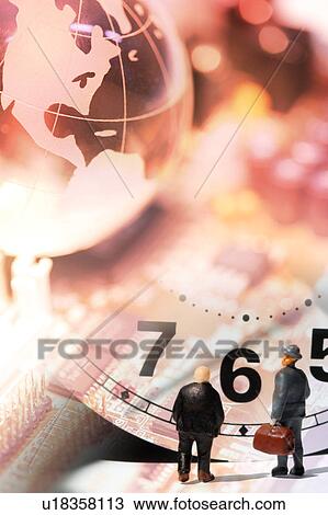 Drawing - Toy figurine, clock and a globe. Fotosearch