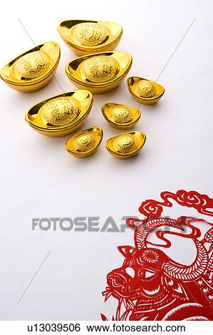 Close-up of gold ingots and decoupage View Large Photo Image Stock Photograph - Close-up of gold ingots and decoupage. Fotosearch