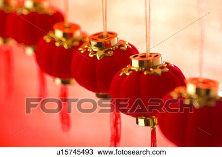 Stock Image - Close-up of lantern decorations in a row. Fotosearch