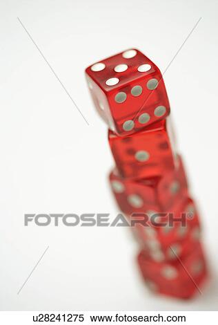 Stock Photography - Close-up of five dice one on top of the other. Fotosearch