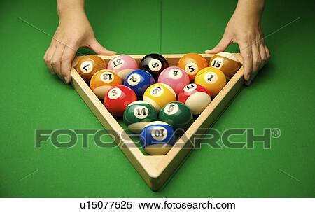 Woman setting balls into triangle for game of pool, close-up View Large Photo Image Stock Photography - Woman setting balls into triangle for game of pool, close-up. Fotosearch