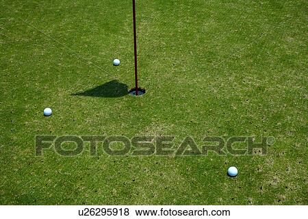 Stock Photo - Flag on putting green. Fotosearch