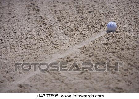 Golf ball in the sand trap View Large Photo Image Stock Photography - Golf ball in the sand trap. Fotosearch
