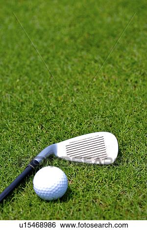 Golf club and golf ball, ground view, close up View Large Photo Image Stock Photograph - Golf club and golf ball, ground view, close up. Fotosearch