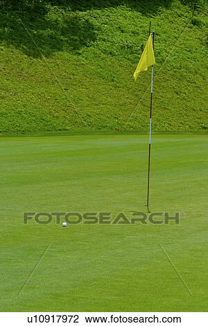 Yellow flag on green View Large Photo Image Stock Image - Yellow flag on green. Fotosearch