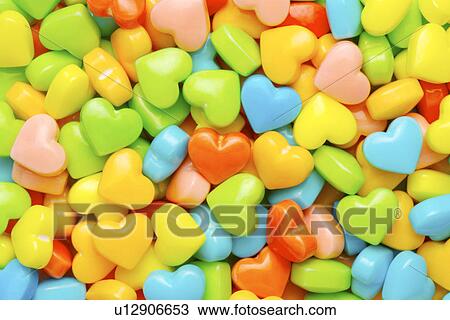 Colorful heart-shaped candies, full frame View Large Photo Image Stock Image - Colorful heart-shaped candies, full frame. Fotosearch