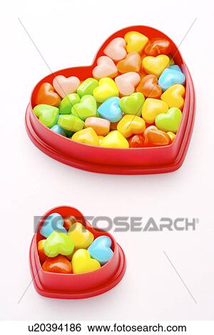 Stock Photograph - Colorful heart-shaped candies. Fotosearch