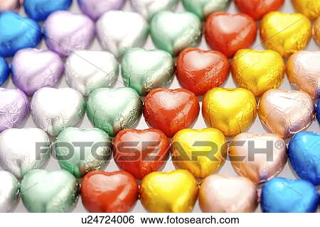 Colorful heart-shaped candies View Large Photo Image Stock Photograph - Colorful heart-shaped candies. Fotosearch