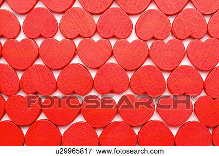 Stock Photo - Heart-shaped objects, full frame. Fotosearch