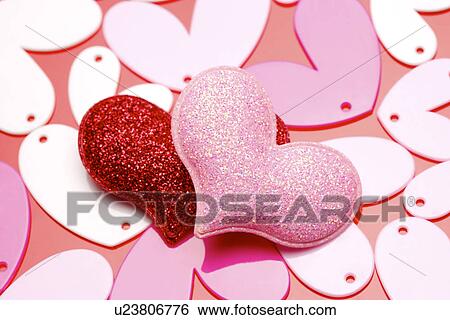 Two heart shaped objects View Large Photo Image Stock Photograph - Two heart shaped objects. Fotosearch