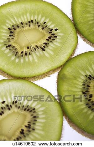 Stock Image - Kiwi, cross section. Fotosearch