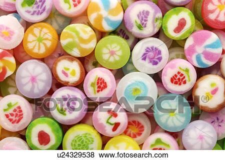 Stock Photo - Muti colored candies, full frame. Fotosearch