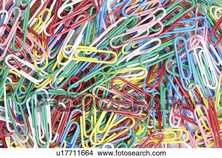 Stack of multi coloured paperclips, close up, full frame View Large Photo Image Picture - Stack of multi coloured paperclips, close up, full frame. Fotosearch
