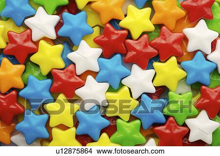 Picture - Star shaped candies, full frame. Fotosearch