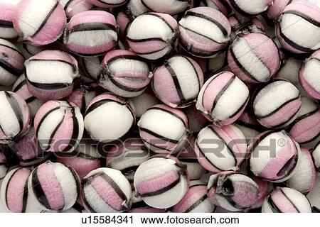 Stock Image - Three toned candies, full frame. Fotosearch