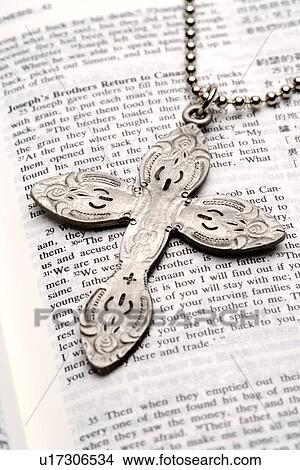Bible and cross View Large Photo Image Picture - Bible and cross. Fotosearch